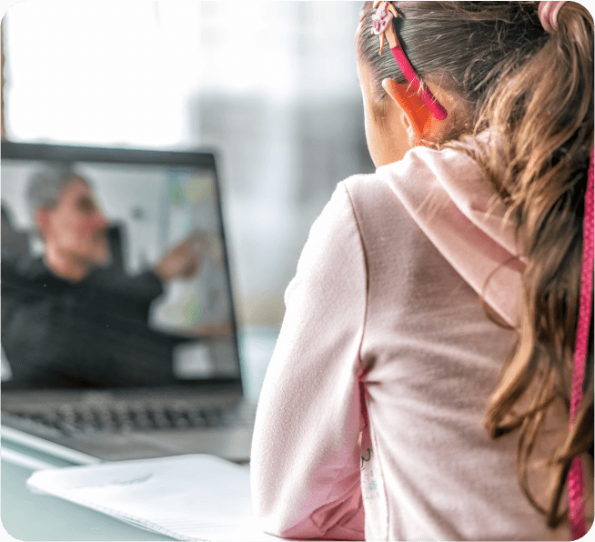 Child using computer for online tutoring