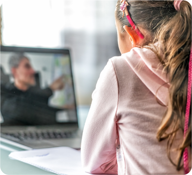 Child using computer for online tutoring